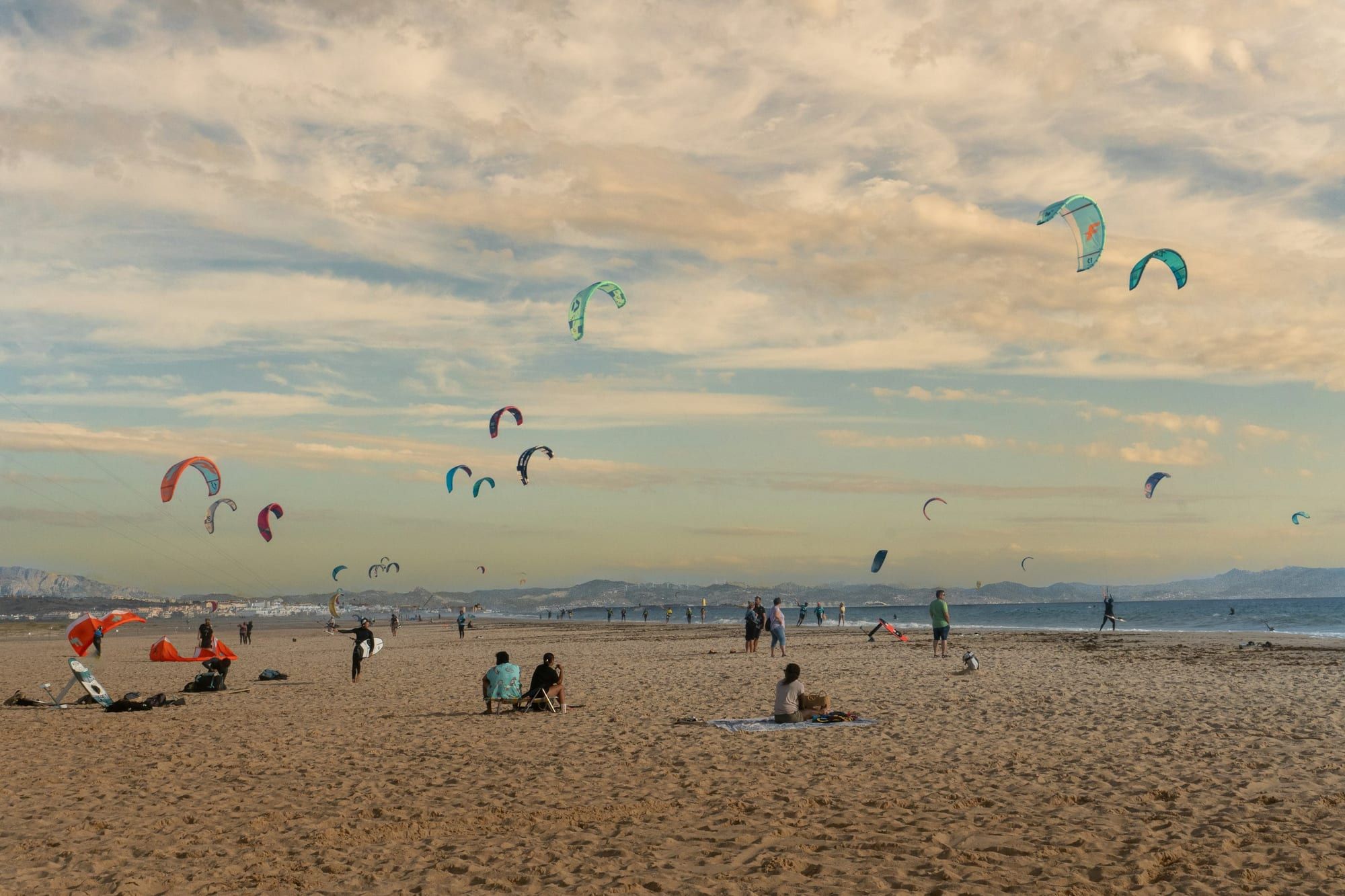 Kitesurfers' kites over the beach in Tarifa